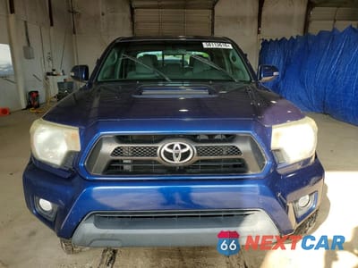 Piąte zdjęcie samochodu w środku: 2015 TOYOTA TACOMA V6 VIN:3TMLU4EN5FM182619 - miniatura