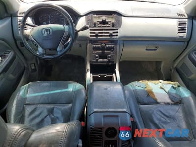 Zdjęcie 8 z 13 samochodu: 2004 HONDA PILOT EXL VIN:2HKYF18614H615441 - miniatura