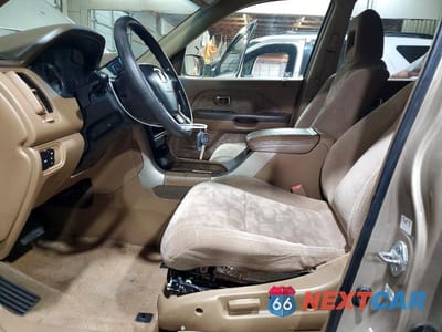Zdjęcie 7 z 14 samochodu: 2003 HONDA PILOT EX VIN:2HKYF18413H606557 - miniatura