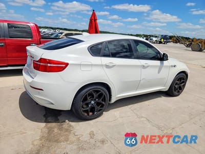 Trzecie zdjęcie samochodu z tyłu: 2010 BMW X6 M VIN:5YMGZ0C50ALK13081 - miniatura