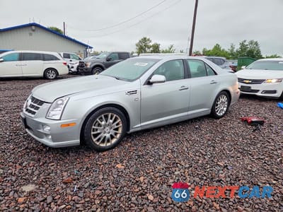 2010 CADILLAC STS 1G6DU6EA9A0149232 - główne zdjęcie licytacji z USA - miniatura