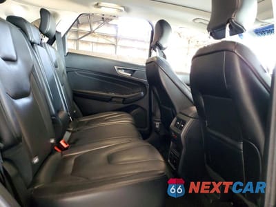 Zdjęcie 11 z 13 samochodu: 2019 FORD EDGE TITANIUM VIN:2FMPK4K90KBC02023 - miniatura