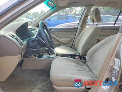 Zdjęcie 7 z 12 samochodu: 2002 HONDA CIVIC LX VIN:1HGES16692L005069 - miniatura
