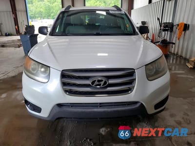 Piąte zdjęcie samochodu w środku: 2012 HYUNDAI SANTA FE GLS VIN:5XYZGDABXCG117996 - miniatura