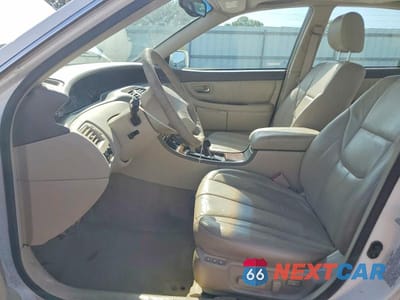 Zdjęcie 7 z 13 samochodu: 2000 TOYOTA AVALON XLS VIN:4T1BF28B8YU106091 - miniatura