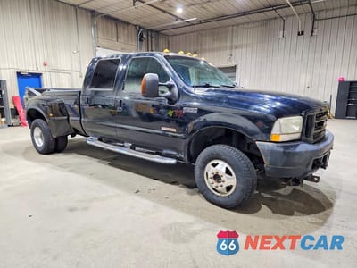 Czwarte zdjęcie samochodu z boku: 2003 FORD F350 SUPER DUTY VIN:1FTWW33P23EC50057 - miniatura