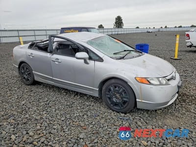 Czwarte zdjęcie samochodu z boku: 2006 HONDA CIVIC LX VIN:1HGFA16586L153296 - miniatura