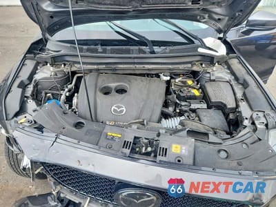 Zdjęcie 12 z 13 samochodu: 2021 MAZDA CX-5 GRAND TOURING VIN:JM3KFBDM3M1499528 - miniatura