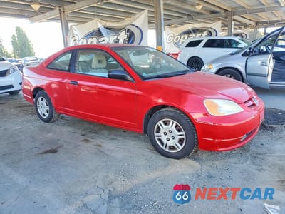 Czwarte zdjęcie samochodu z boku: 2001 HONDA CIVIC LX VIN:1HGEM22561L034945 - miniatura