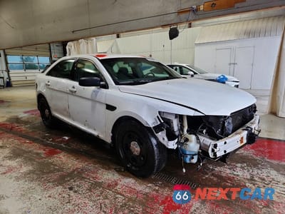 Czwarte zdjęcie samochodu z boku: 2015 FORD TAURUS POLICE INTERCEPTOR VIN:1FAHP2MK1FG157290 - miniatura