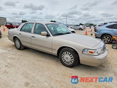 Czwarte zdjęcie samochodu z boku: 2008 MERCURY GRAND MARQUIS LS VIN:2MEFM75VX8X628994 - miniatura