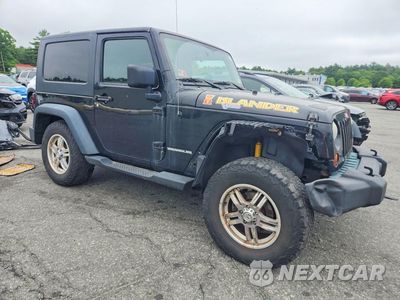 Czwarte zdjęcie samochodu z boku: 2010 JEEP WRANGLER SPORT VIN:1J4AA2D18AL157527 - miniatura