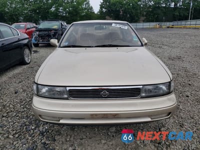 Piąte zdjęcie samochodu w środku: 1992 NISSAN MAXIMA GXE VIN:JN1HJ01P7NT605525 - miniatura