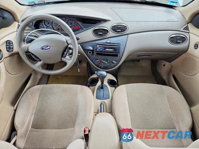Zdjęcie 8 z 12 samochodu: 2003 FORD FOCUS SE COMFORT VIN:1FAFP34363W113907 - miniatura