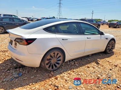 Trzecie zdjęcie samochodu z tyłu: 2022 TESLA MODEL 3 VIN:5YJ3E1EC1NF107378 - miniatura