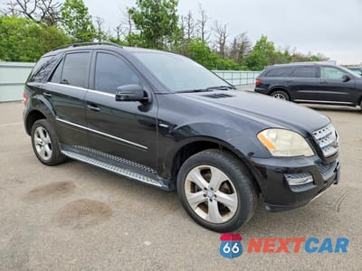 Czwarte zdjęcie samochodu z boku: 2011 MERCEDES-BENZ ML 350 BLUETEC VIN:4JGBB2FB9BA628543 - miniatura