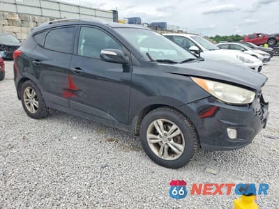 Czwarte zdjęcie samochodu z boku: 2013 HYUNDAI TUCSON GLS VIN:KM8JUCAC6DU755179 - miniatura