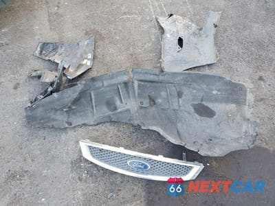 Zdjęcie 12 z 13 samochodu: 2006 FORD FOCUS ZX4 VIN:1FAHP34N66W177377 - miniatura
