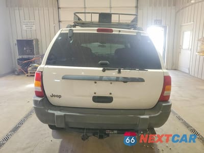 Zdjęcie 6 z 13 samochodu: 2001 JEEP GRAND CHEROKEE LAREDO VIN:1J4GW48S21C686417 - miniatura