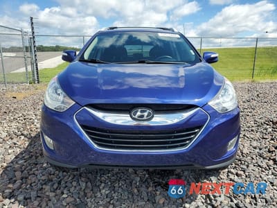 Piąte zdjęcie samochodu w środku: 2013 HYUNDAI TUCSON LIMITED VIN:KM8JUCAC2DU581823 - miniatura