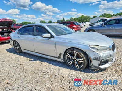 Czwarte zdjęcie samochodu z boku: 2016 BMW 750 XI VIN:WBA7F2C55GG419198 - miniatura