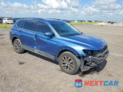 Czwarte zdjęcie samochodu z boku: 2019 VOLKSWAGEN TIGUAN SE VIN:3VV3B7AX8KM052747 - miniatura
