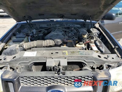 Zdjęcie 11 z 12 samochodu: 2005 FORD EXPLORER SPORT TRAC VIN:1FMZU67K15UB93390 - miniatura