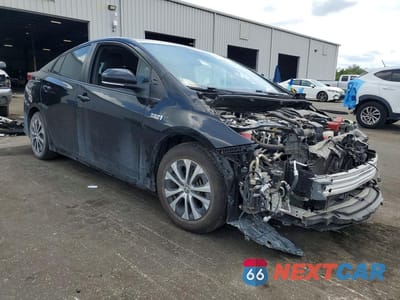 Czwarte zdjęcie samochodu z boku: 2021 TOYOTA PRIUS PRIME LIMITED VIN:JTDKAMFP8M3174808 - miniatura