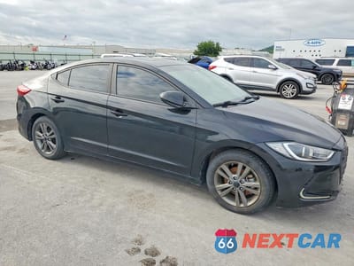Czwarte zdjęcie samochodu z boku: 2017 HYUNDAI ELANTRA VALUE EDITION VIN:KMHD84LF1HU248114 - miniatura