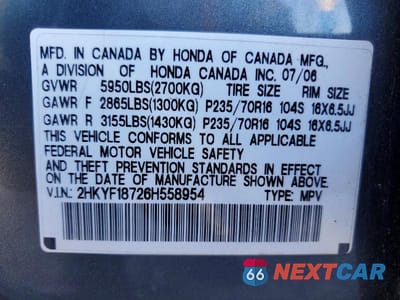 Zdjęcie 13 z 13 samochodu: 2006 HONDA PILOT EX VIN:2HKYF18726H558954 - miniatura
