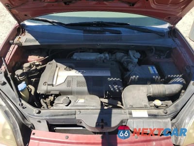 Zdjęcie 12 z 13 samochodu: 2006 HYUNDAI TUCSON GL VIN:KM8JM12B56U437504 - miniatura