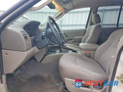 Zdjęcie 7 z 13 samochodu: 2002 JEEP GRAND CHEROKEE LAREDO VIN:1J4GX48S12C313948 - miniatura