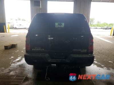 Zdjęcie 6 z 12 samochodu: 2014 HONDA RIDGELINE SPORT VIN:5FPYK1F70EB004234 - miniatura