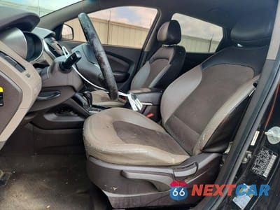 Zdjęcie 7 z 13 samochodu: 2012 HYUNDAI TUCSON GLS VIN:KM8JU3AC6CU360739 - miniatura