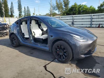 Czwarte zdjęcie samochodu z boku: 2020 TESLA MODEL Y VIN:5YJYGDEE4LF014497 - miniatura