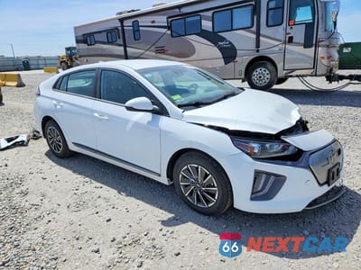 Czwarte zdjęcie samochodu z boku: 2021 HYUNDAI IONIQ SE VIN:KMHC75LJ5MU077161 - miniatura