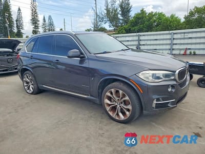 Czwarte zdjęcie samochodu z boku: 2017 BMW X5 XDR40E VIN:5UXKT0C36H0V97929 - miniatura