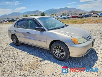 Czwarte zdjęcie samochodu z boku: 2001 HONDA CIVIC LX VIN:2HGES16581H546746 - miniatura