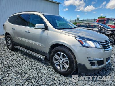 Czwarte zdjęcie samochodu z boku: 2017 CHEVROLET TRAVERSE LT VIN:1GNKRHKD4HJ169125 - miniatura
