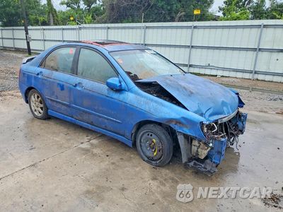 Czwarte zdjęcie samochodu z boku: 2006 KIA SPECTRA EX VIN:KNAFE121265215671 - miniatura