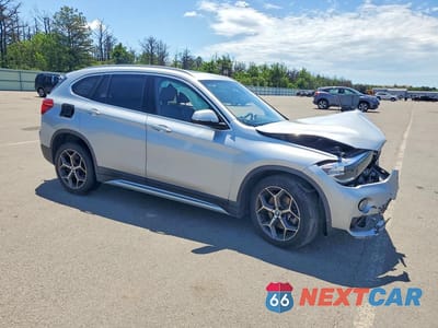 Czwarte zdjęcie samochodu z boku: 2018 BMW X1 XDRIVE28I VIN:WBXHT3C38J3H30536 - miniatura
