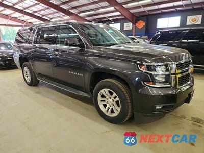 Czwarte zdjęcie samochodu z boku: 2018 CHEVROLET SUBURBAN K1500 LT VIN:1GNSKHKC8JR111392 - miniatura
