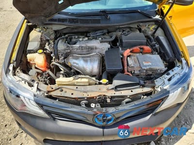 Zdjęcie 11 z 12 samochodu: 2013 TOYOTA CAMRY HYBRID LE VIN:4T1BD1FK5DU075315 - miniatura