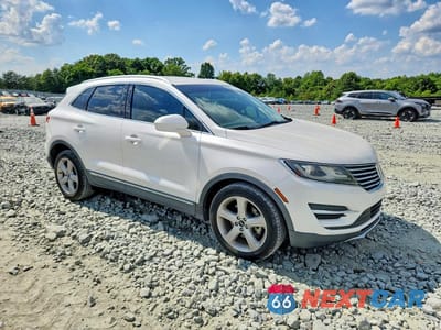 Czwarte zdjęcie samochodu z boku: 2018 LINCOLN MKC PREMIERE VIN:5LMCJ1C95JUL14837 - miniatura