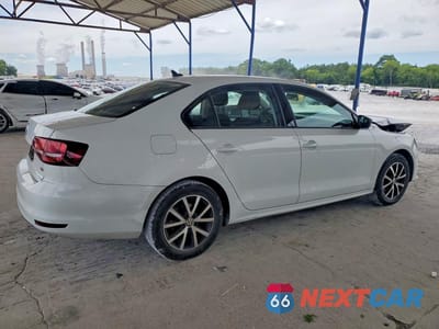 Trzecie zdjęcie samochodu z tyłu: 2016 VOLKSWAGEN JETTA SE VIN:3VWD67AJ9GM359769 - miniatura
