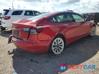 Trzecie zdjęcie samochodu z tyłu: 2023 TESLA MODEL 3 VIN:5YJ3E1EA3PF383806 - miniatura