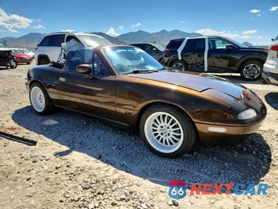Czwarte zdjęcie samochodu z boku: 1995 MAZDA MX-5 MIATA VIN:JM1NA3537S0614117 - miniatura