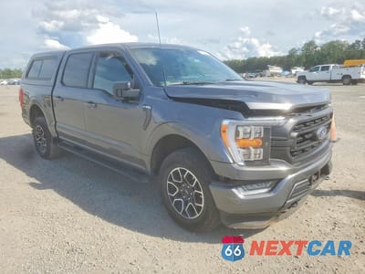 Czwarte zdjęcie samochodu z boku: 2022 FORD F150 SUPERCREW VIN:1FTFW1E89NFB24317 - miniatura