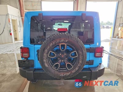 Zdjęcie 6 z 12 samochodu: 2018 JEEP WRANGLER UNLIMITED SAHARA VIN:1C4BJWEG0JL826202 - miniatura