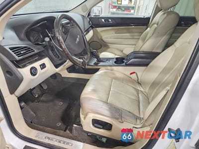 Zdjęcie 7 z 13 samochodu: 2013 LINCOLN MKT VIN:2LMHJ5AT2DBL57058 - miniatura